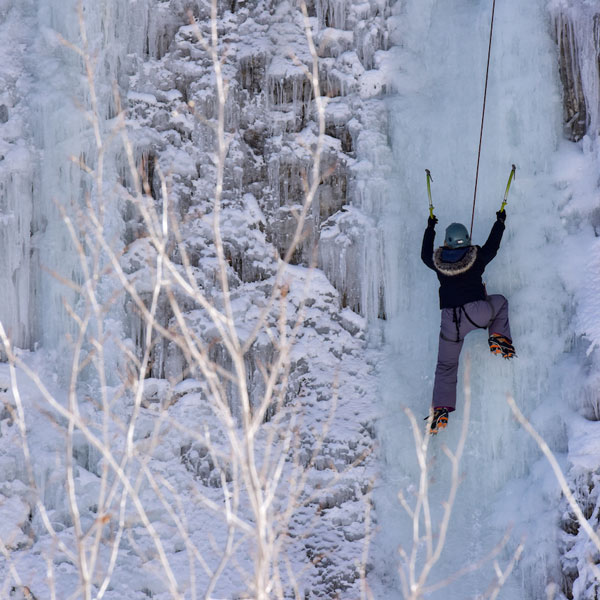 Ice Climber scaling a wall